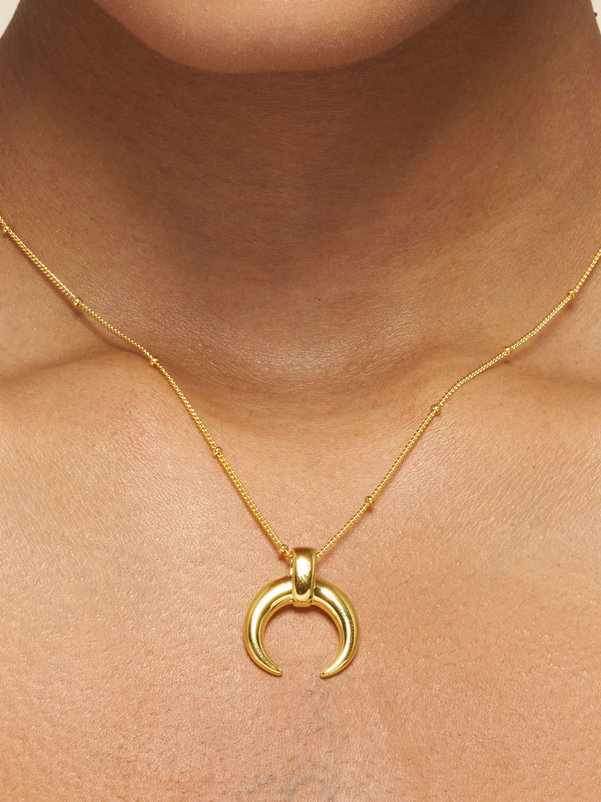 Golden Crescent Horn Pendant Necklace